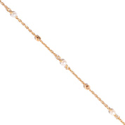 Bracelet doré chaîne perlée et nacre - Bijou photographié sur fond blanc 