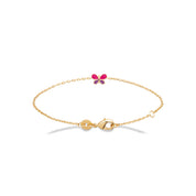 Bracelet doré enfant papillon Justine - Bijou photographié sur fond blanc