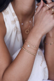 Bracelet doré River fleurs - Bijou porté