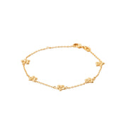 Bracelet doré River fleurs - Bijou photographié sur fond blanc