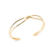 Bracelet jonc doré Kiane simple nœud - Bijou photographié sur fond blanc