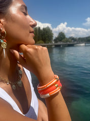 Bracelets dorés Riviera Laranja trio orange et blanc - Bijoux porté