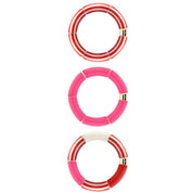 Bracelets dorés Riviera Magenta trio rouge, rose et blanc - Bijoux photographiés sur fond blanc