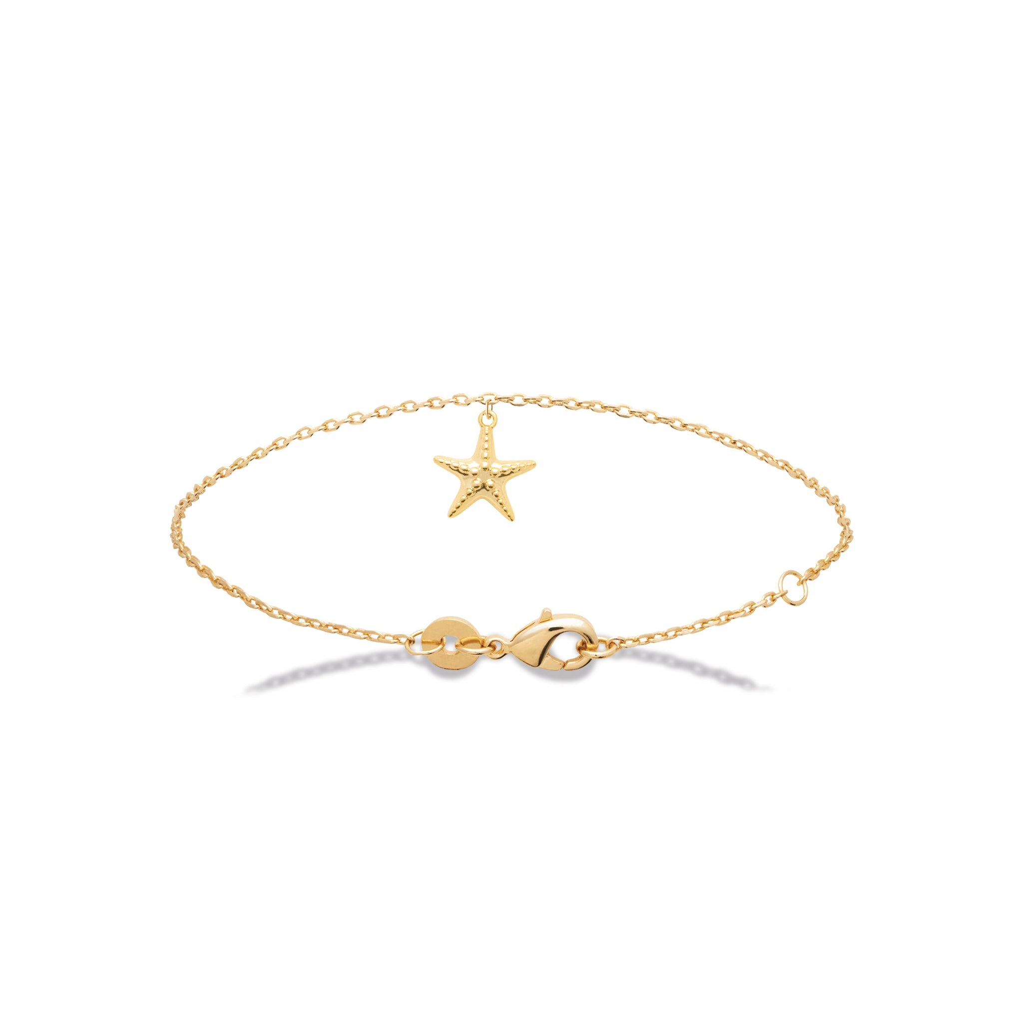 Chaîne de cheville dorée Moana avec pendentif étoile de mer - Bijou photographié sur fond blanc