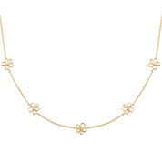 Collier doré Naja fleurs - Bijou photographié sur fond blanc