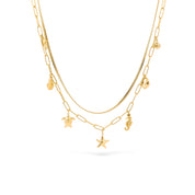 Collier double doré Stephy avec pendentifs marins - Bijou photographié sur fond blanc