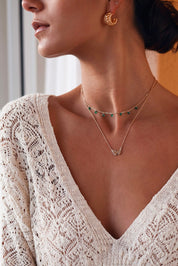 Boucles d'oreilles créoles dorées Dalal - Bijou porté