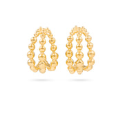 Boucles d'oreilles créoles dorées Eman en gold filled - Bijou photographié sur fond blanc