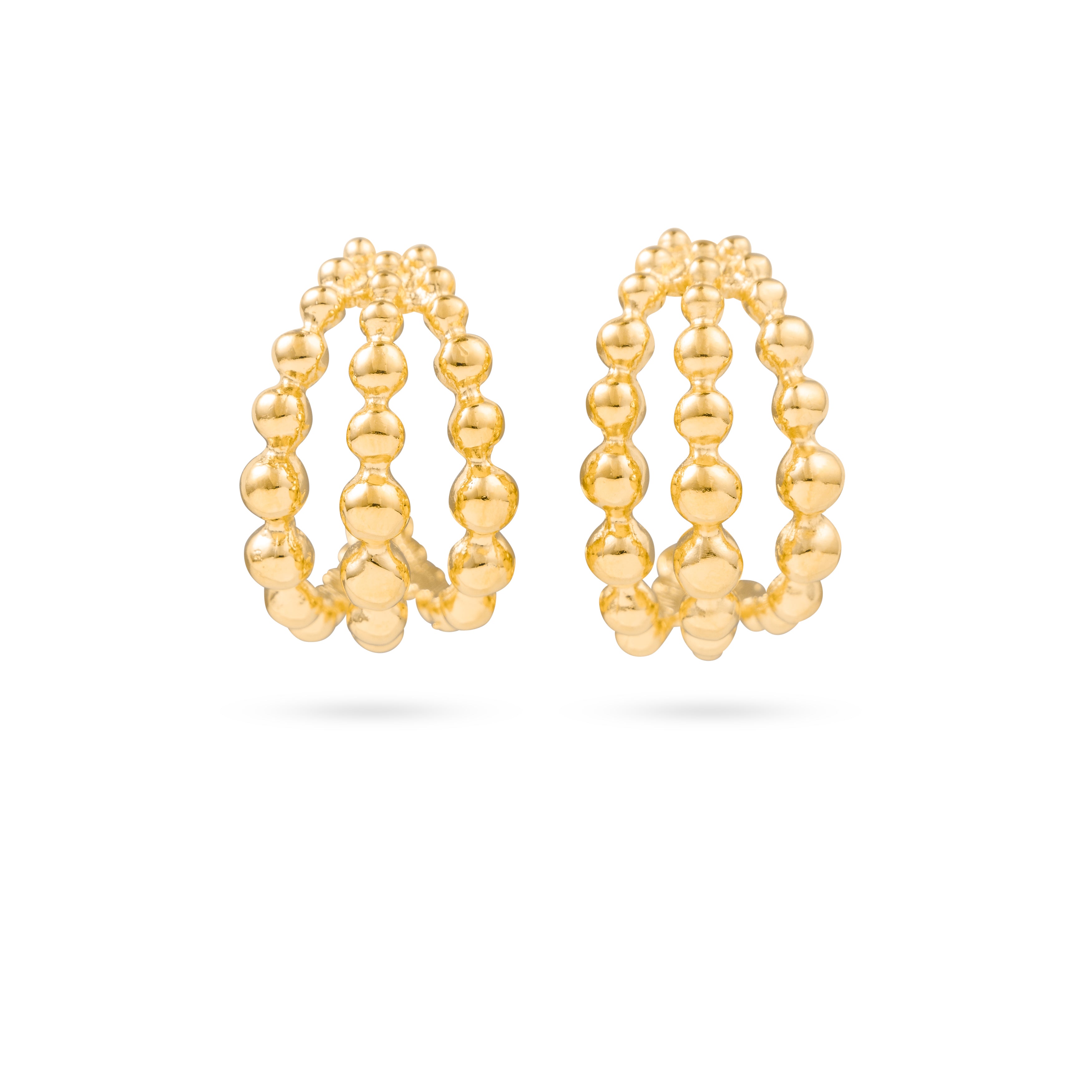 Boucles d'oreilles créoles dorées Eman en gold filled - Bijou photographié sur fond blanc