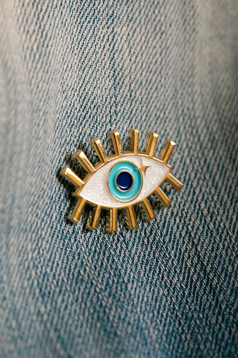 Pin's doré œil - Accessoire